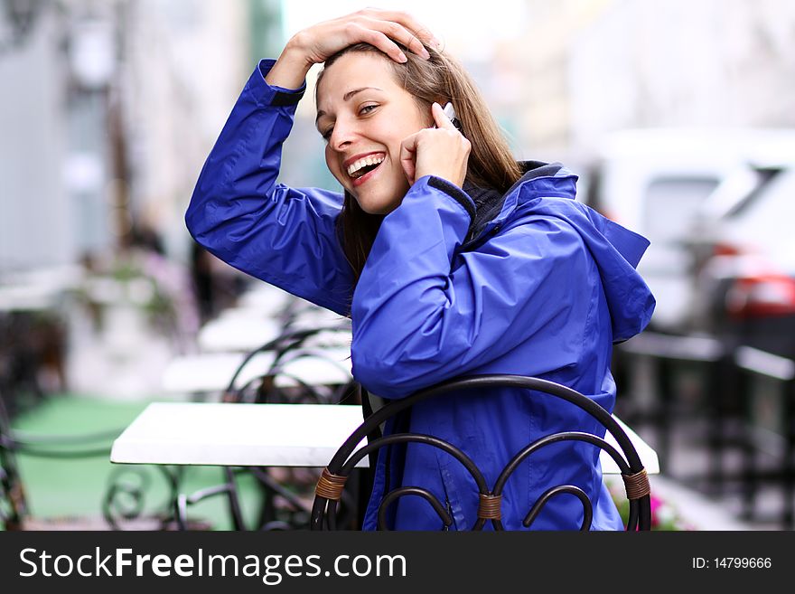 Woman with mobile telephone