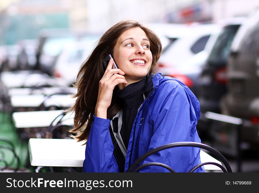 Woman with mobile telephone