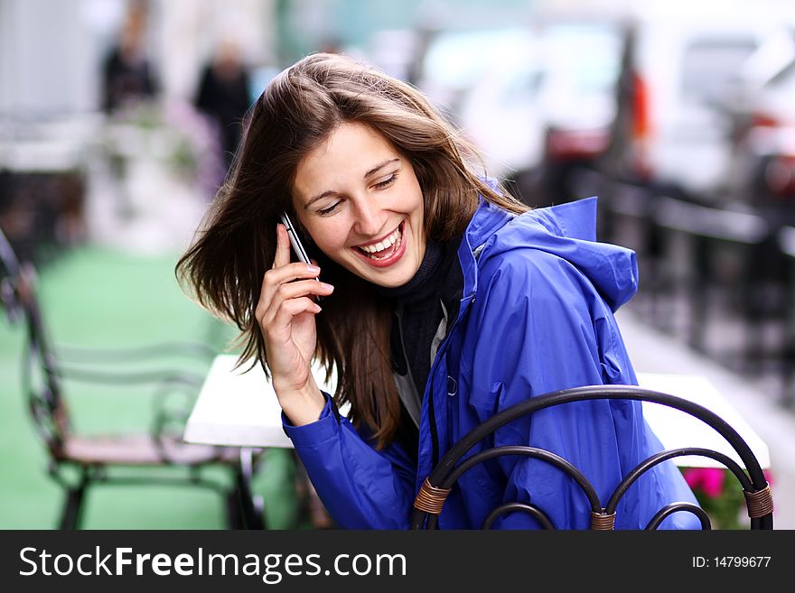 Woman with mobile telephone