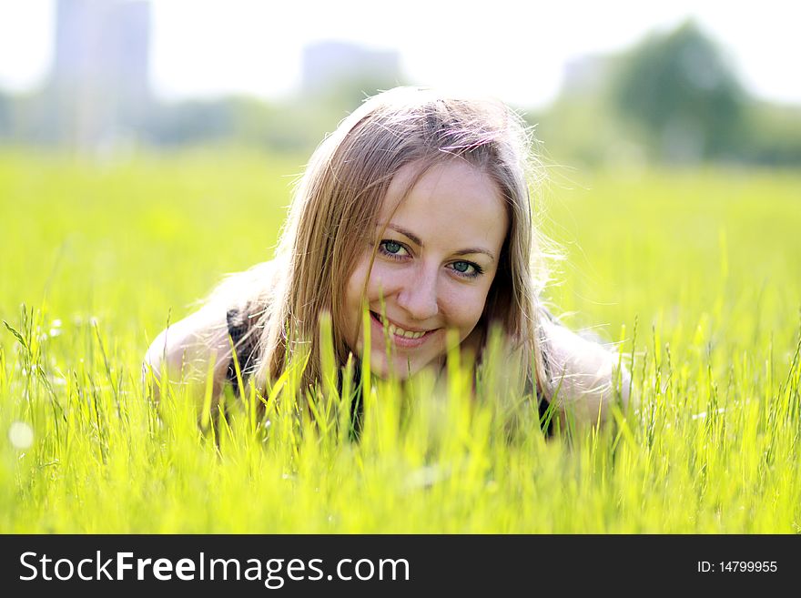 Woman on the green grass