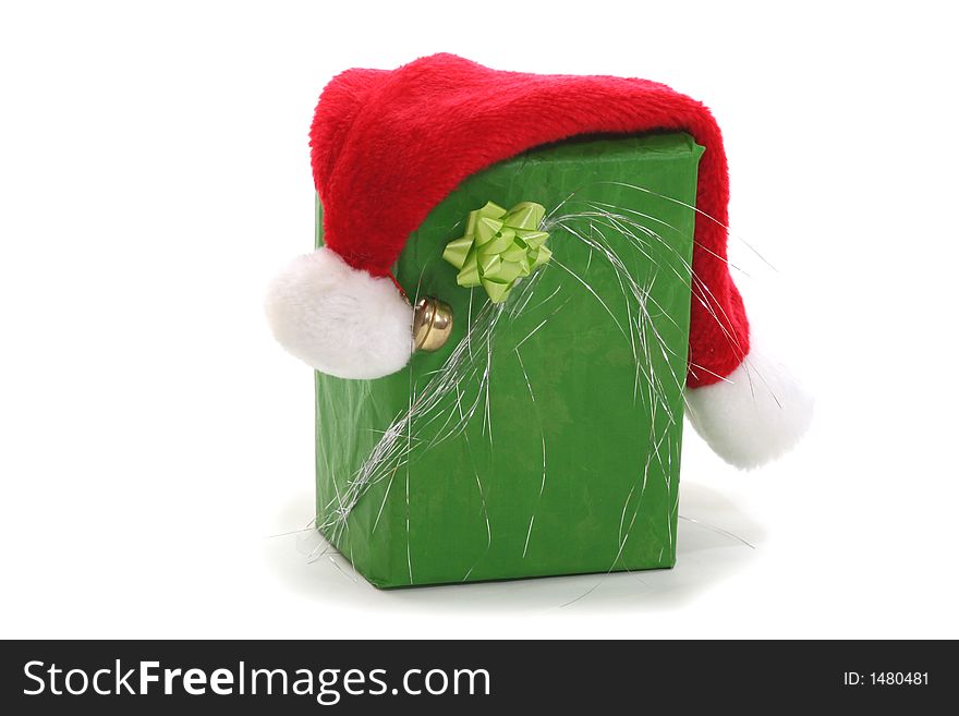 Green christmas present box and santa claus hat. Green christmas present box and santa claus hat