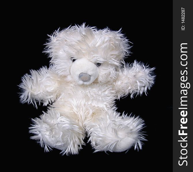 Scruffy white teddy bear soft toy