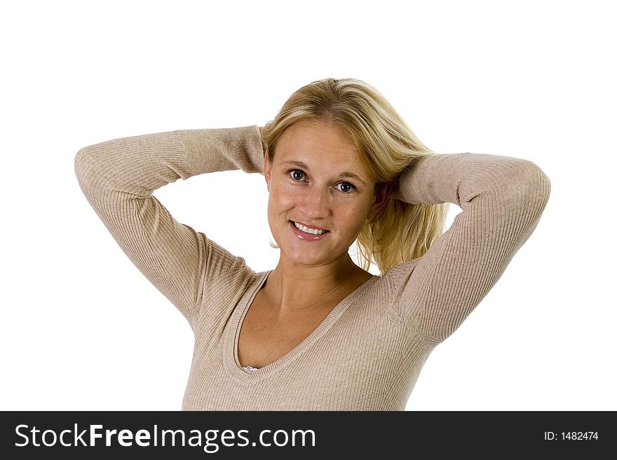 Beautiful blonde woman casual portrait with hands behind her head. Image isolated on white.