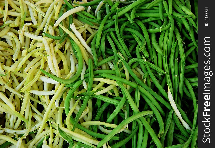 Background of green and yellow string beans. Background of green and yellow string beans