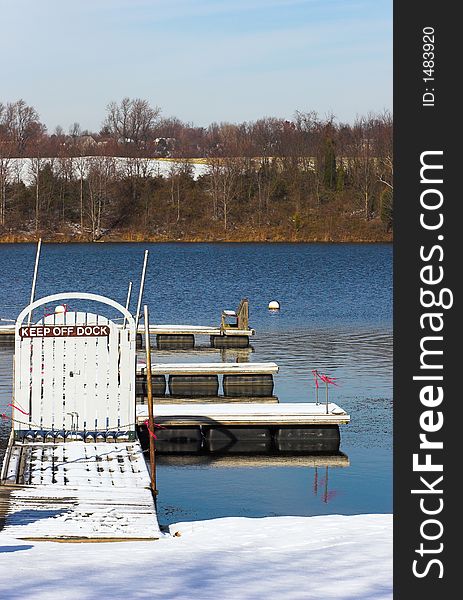Landscape image with lake and Closed winter dock. Seneca Creek State Park, Maryland, USA