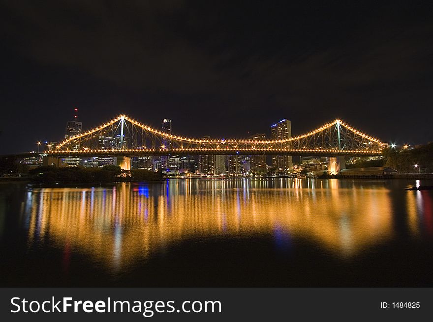 Photo of story bridge by night with cityscape in background. Photo of story bridge by night with cityscape in background