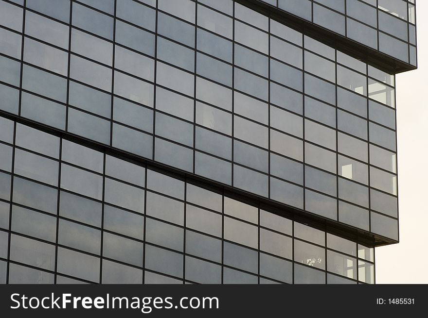Abstract reflecting windows on large business building