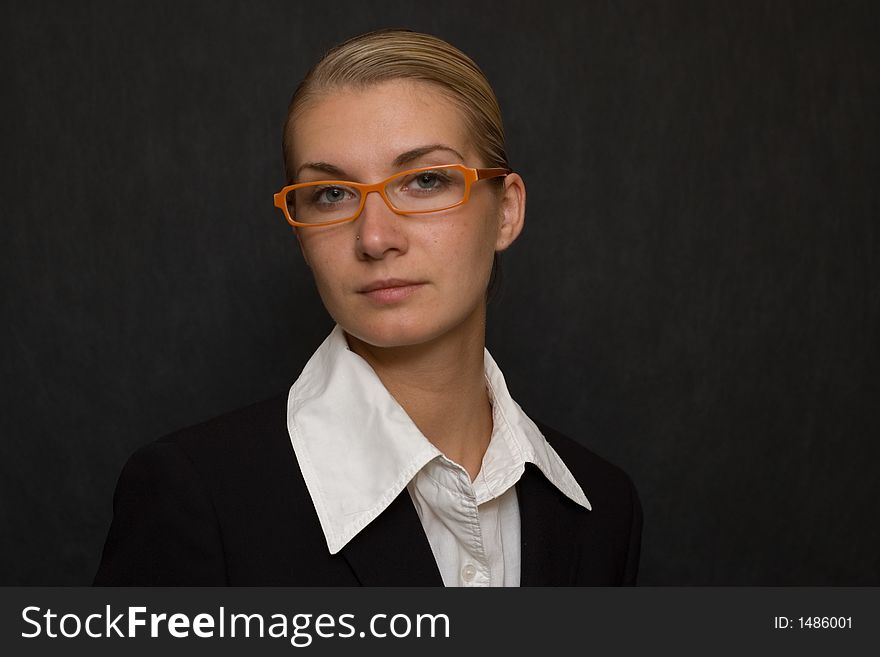 Picture of a business woman with orange glasses. Picture of a business woman with orange glasses