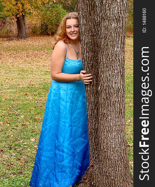 Pretty Teen By A Tree