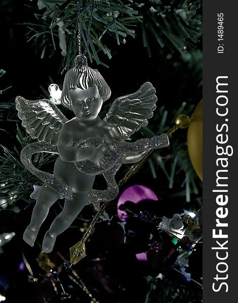 Crystal angel decoration hanging on a christmas tree