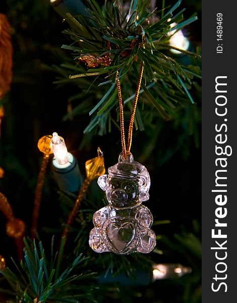 Crystal teddy bear decoration hanging on a christmas tree