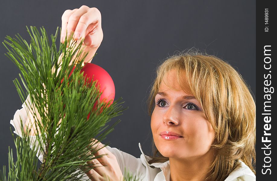 Young Beautiful Woman With Christmas Bauble
