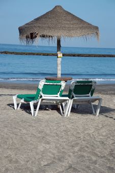 Beach Umbrella And Two Loungers Stock Image Beach Umbrella And Two Loungers Stock Image