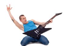 Playing Guitar On Knees Stock Images