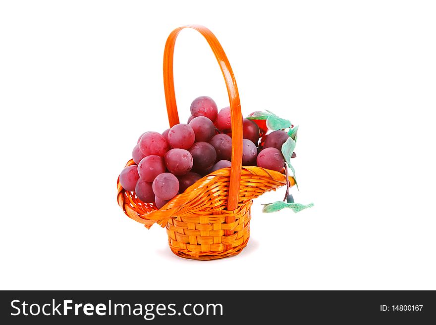 Picture of grapes in the basket on white background. Picture of grapes in the basket on white background