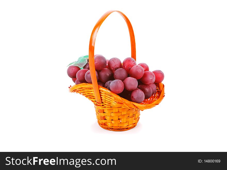 Picture of grapes in the basket on white background. Picture of grapes in the basket on white background