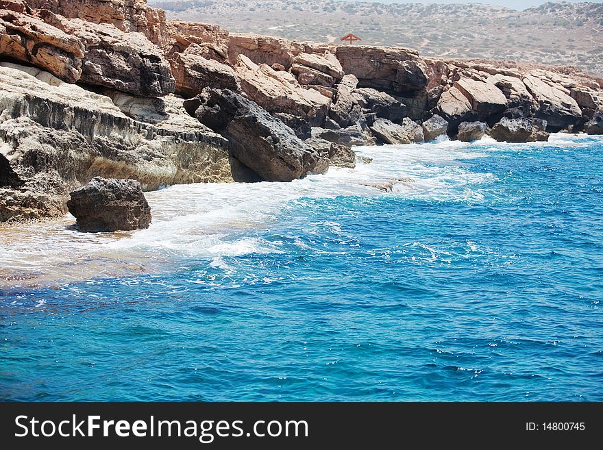 Turquoise water of the Mediterranean sea and coastal rocks
