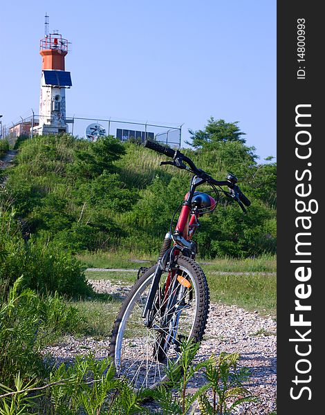 Bike And Lighthouse With Solar Battery