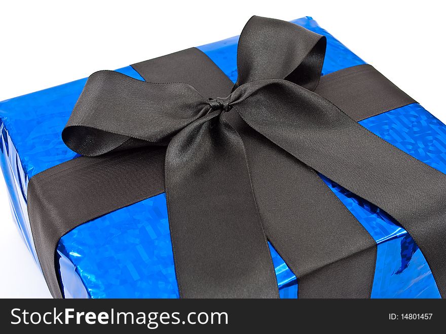 Gift box with black bow close-up