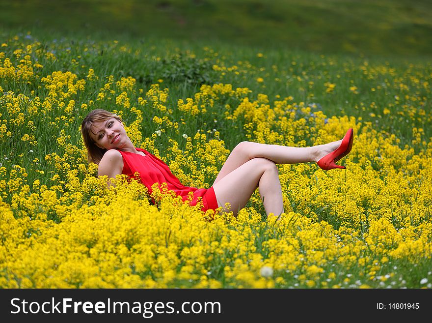 The girl in a blossoming field
