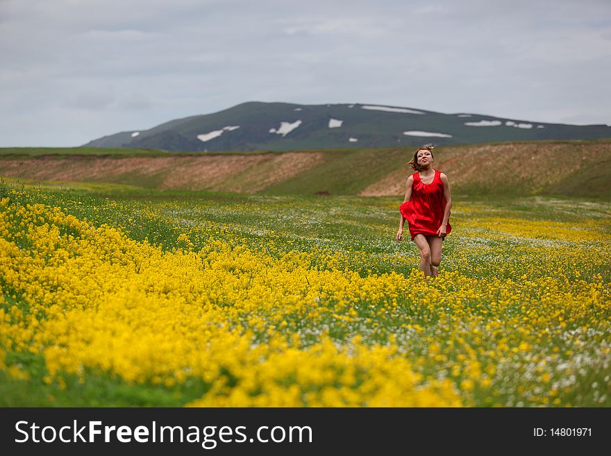 The girl in a blossoming field