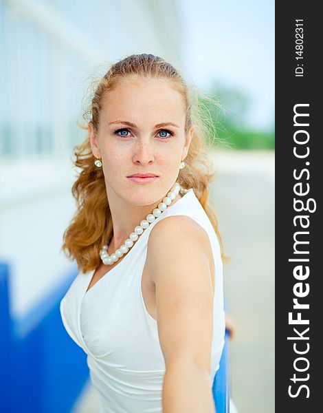 Woman  fashion portrait in outdoors with natural expression