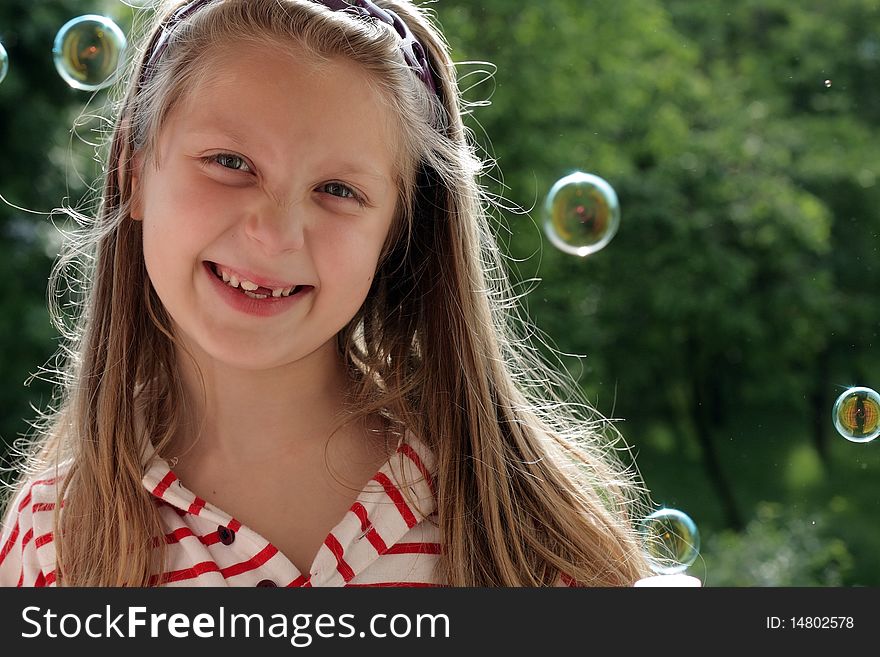 An image of a nice little girl laughing. An image of a nice little girl laughing