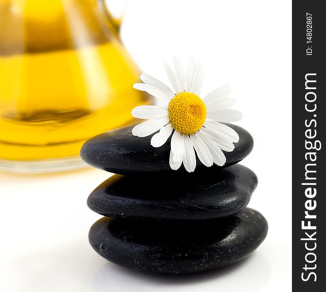 An image of a heap of black stones for spa massage