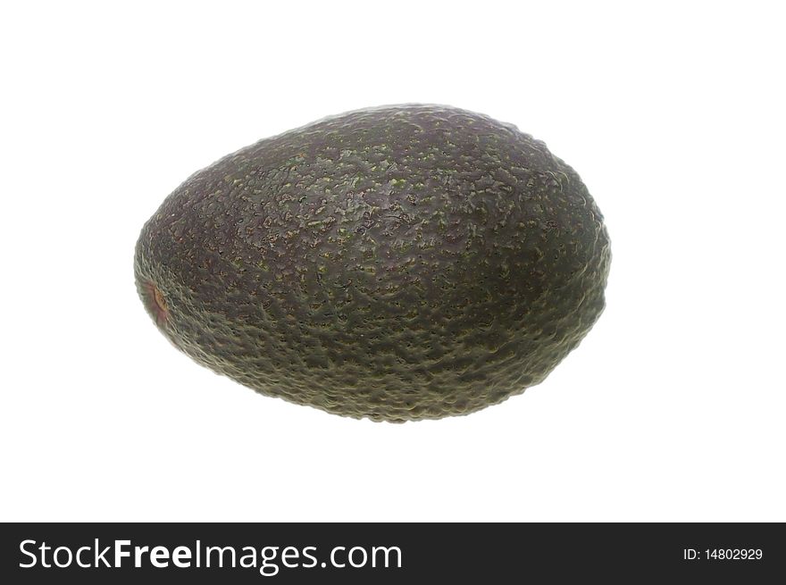 Whole avocado black skin variety over white isolated