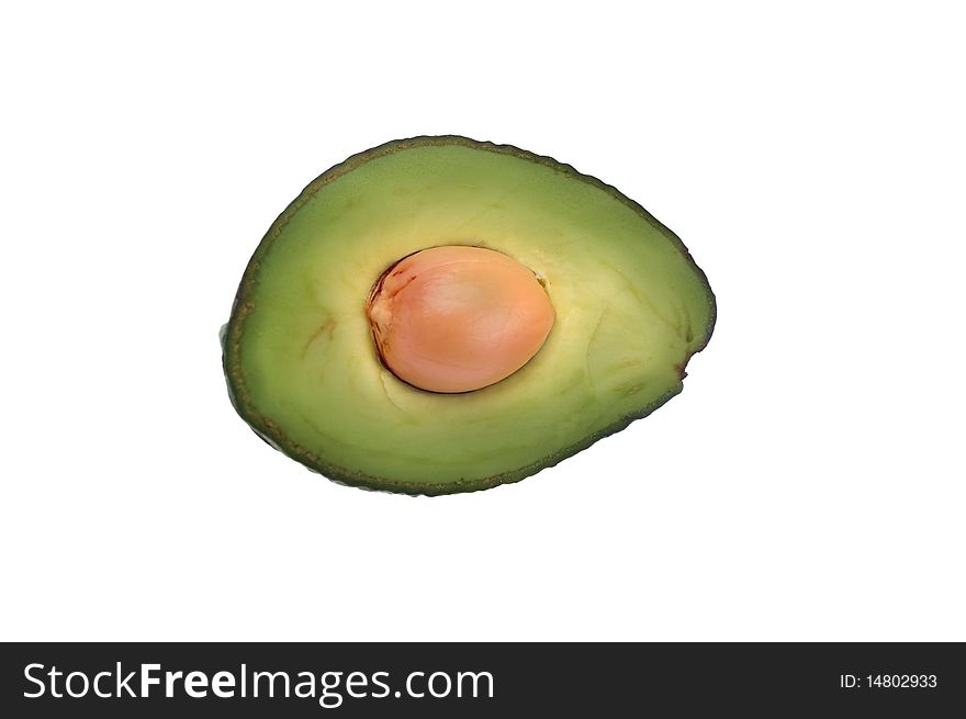 Avocado halved with seed over white isolated. Avocado halved with seed over white isolated