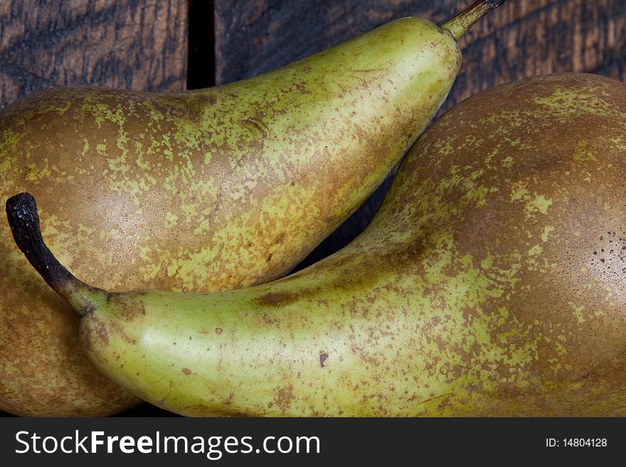 Two fresh pears standing on the table
