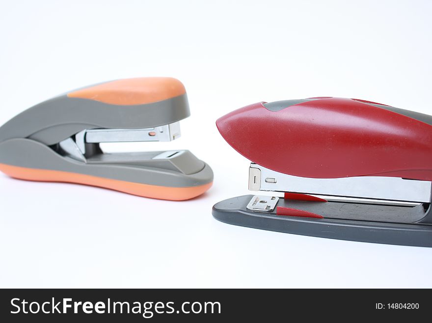 Two staplers for papers of a various configuration