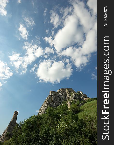 Devin castle together with clouds during sunny day. Devin castle together with clouds during sunny day