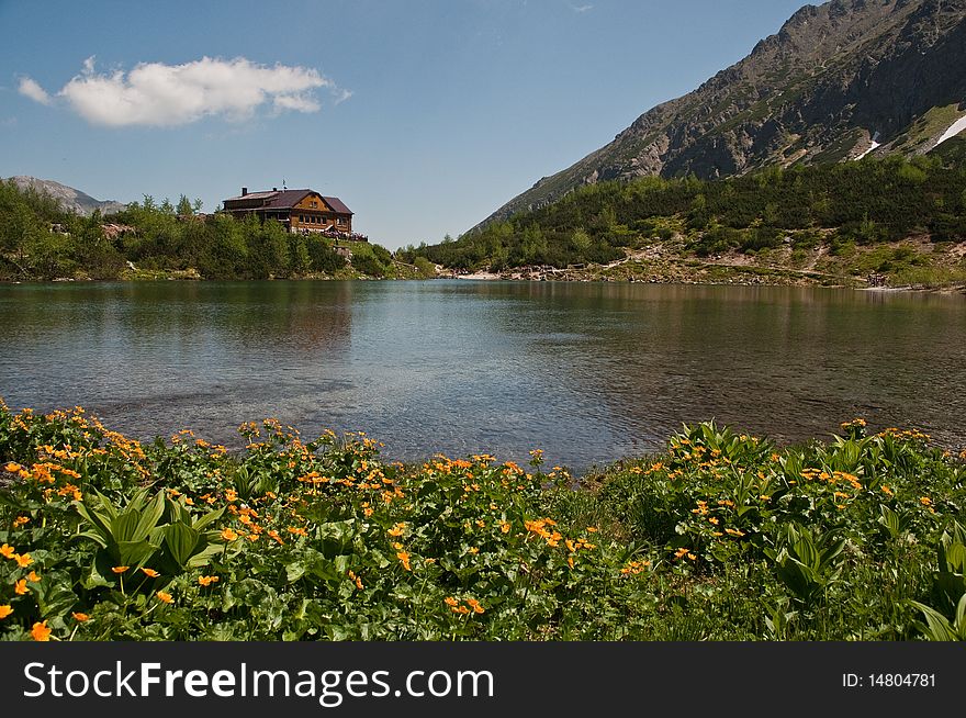 The big cottage near the lake in the mountain