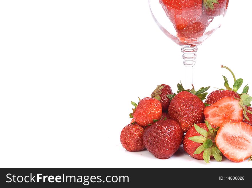 Glass with strawberry on white background
