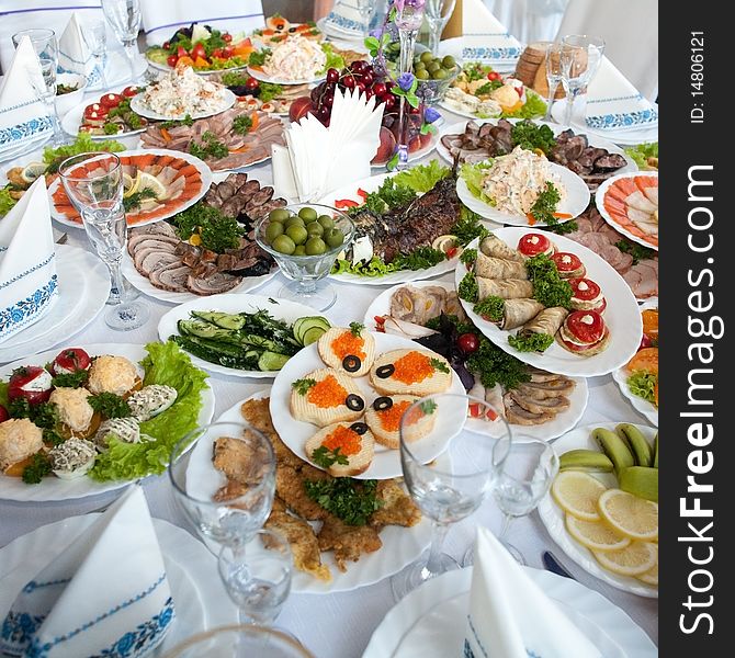 An image of many various dishes on the table