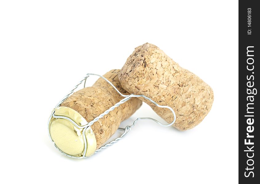 Two champagne corks on a white background