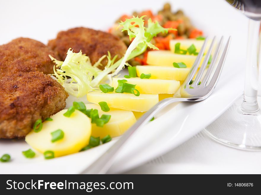 Meatballs with potatoes and vegetables. Meatballs with potatoes and vegetables