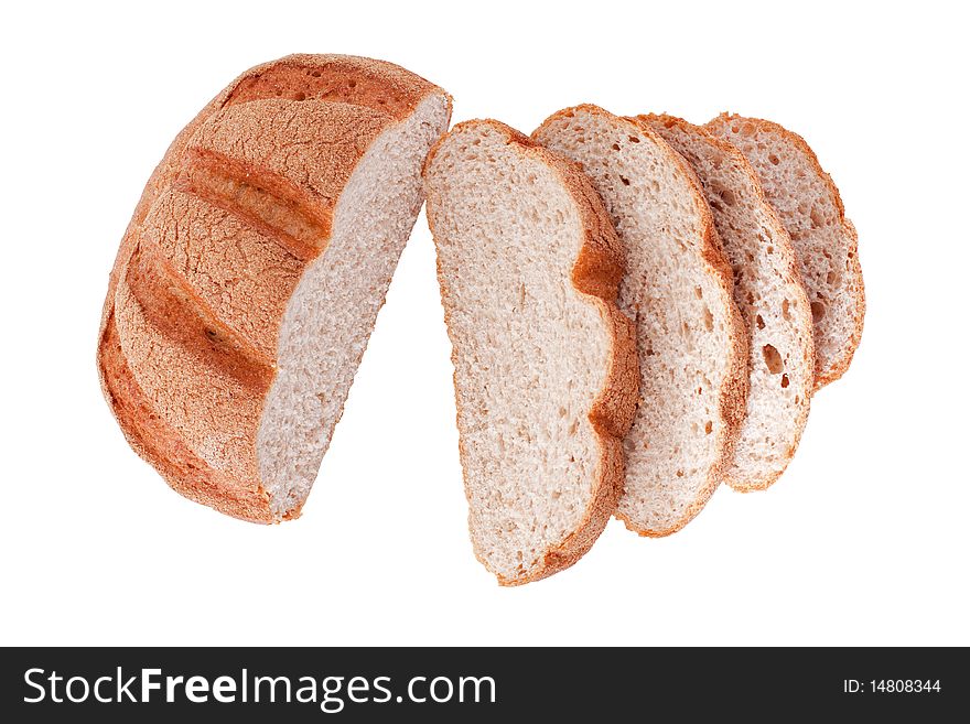 Sliced homemade brown bread, isolated on white