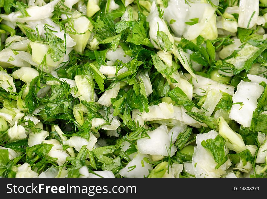 Fresh salad from vegetables and greens on a plate. Fresh salad from vegetables and greens on a plate