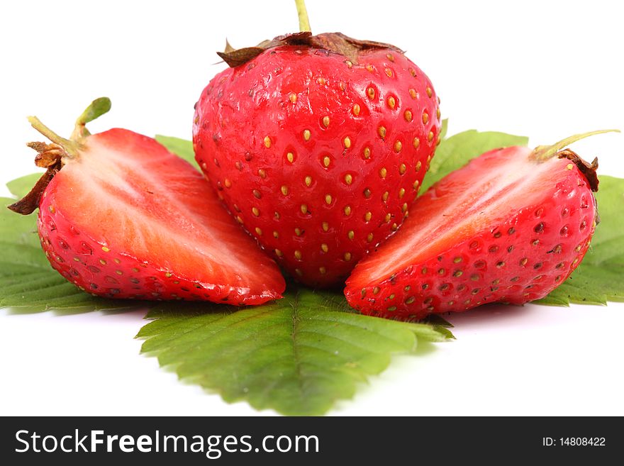 Close-up view of fresh strawberry with leaves