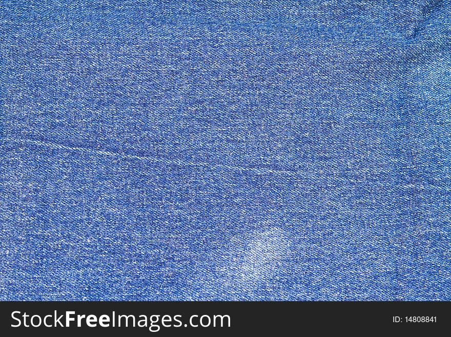 Texture of blue jeans cloth