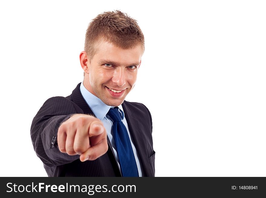 Portrait of business man pointing at you over white