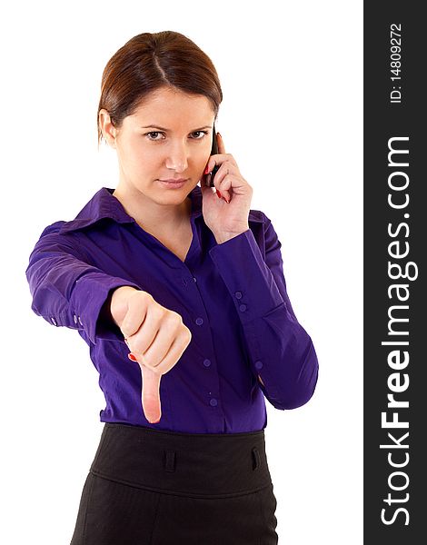 Woman with thumb down gesture and mobile phone