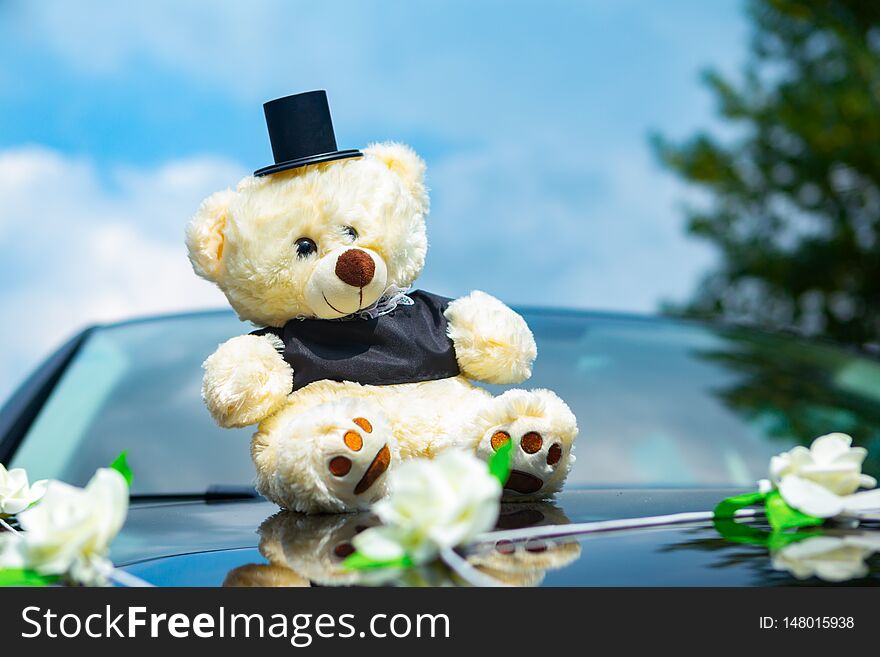 Car Decoration For The Wedding. In The Form Of Bears Dressed Like A Newlywed