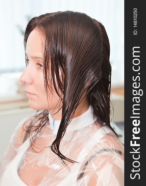 Girl with wet hair in a hairdressing salon. Girl with wet hair in a hairdressing salon