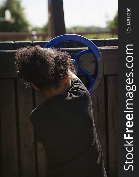 Little girl playing at playground