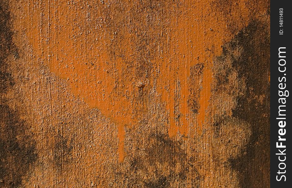 Orange painted grunge wall textured background