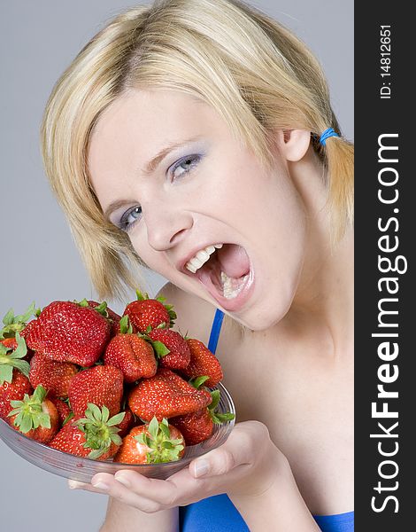 Portrait of woman with strawberries