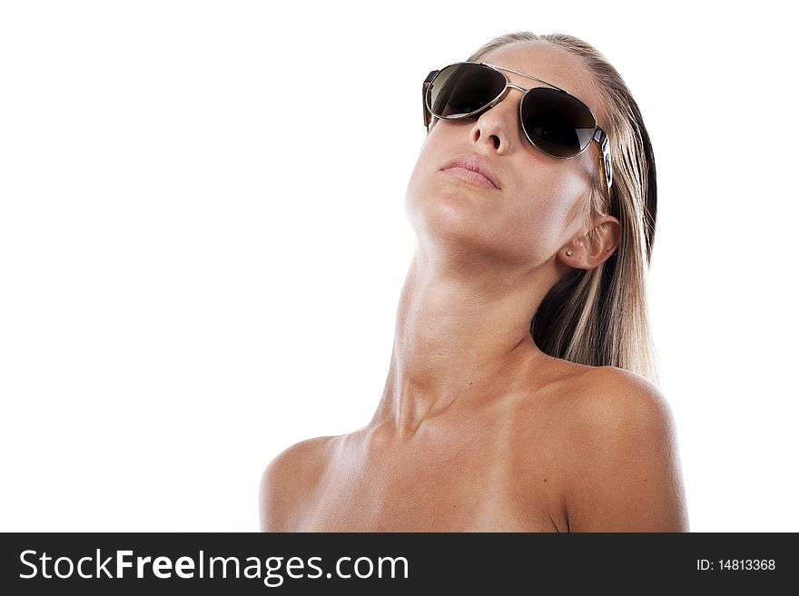 Headshot of a beautiful blond women wearing sunglasses on a white background. Headshot of a beautiful blond women wearing sunglasses on a white background